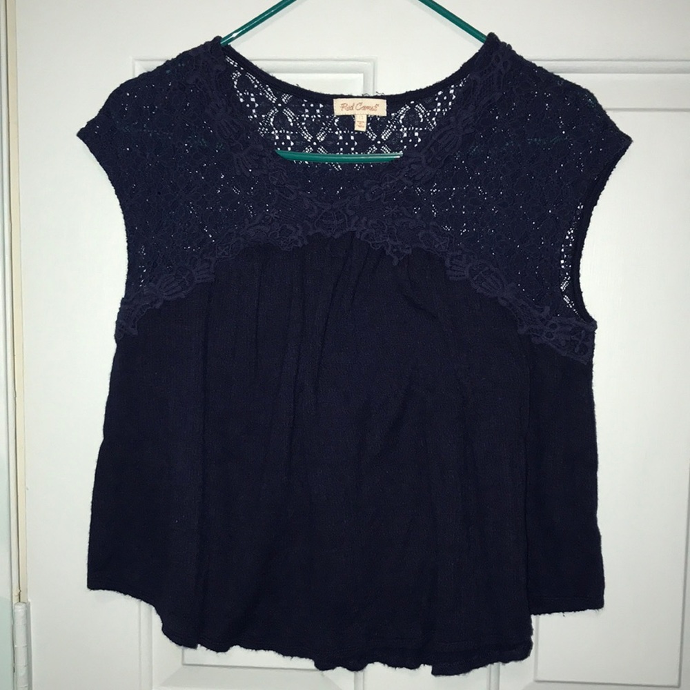Women’s Red Camel size small navy smock type blouse.